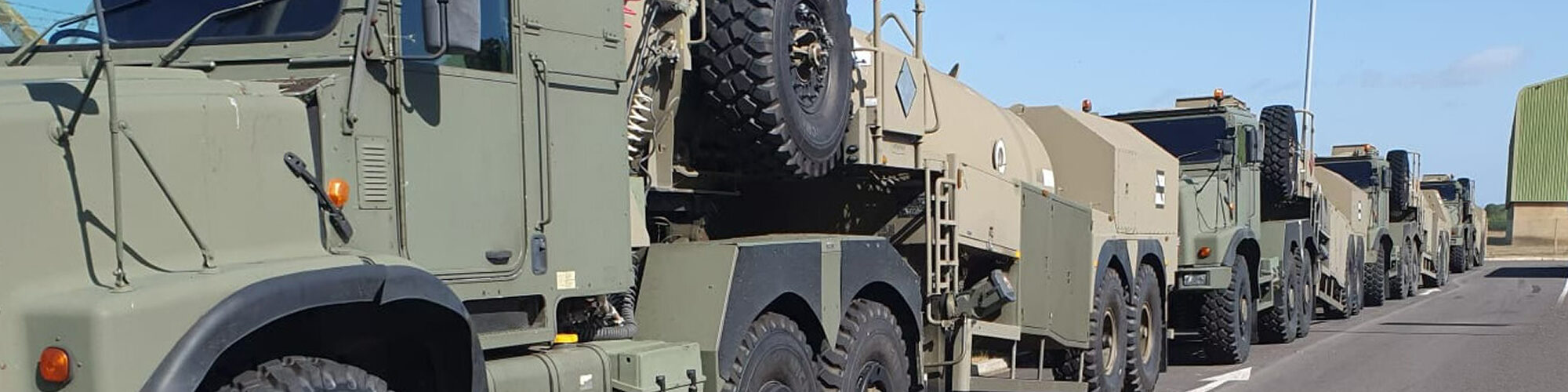 Army trucks in a line