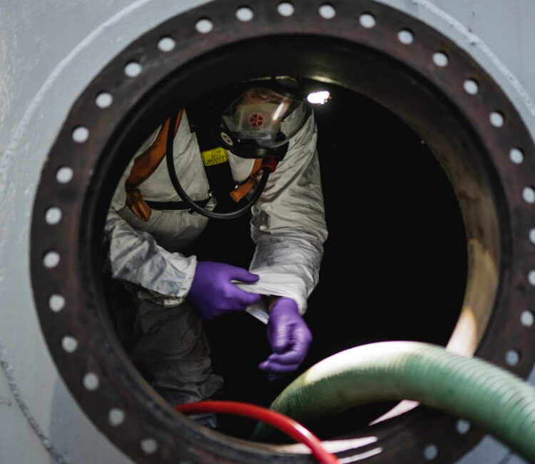 Engineer coming out of tank