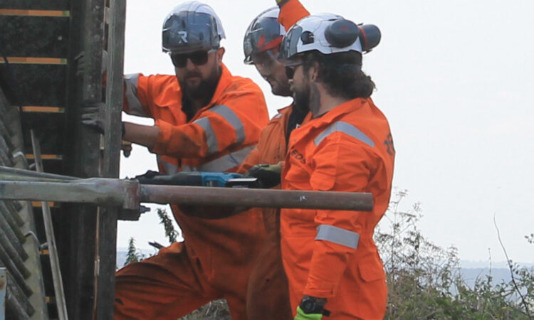 Engineers demolishing structure