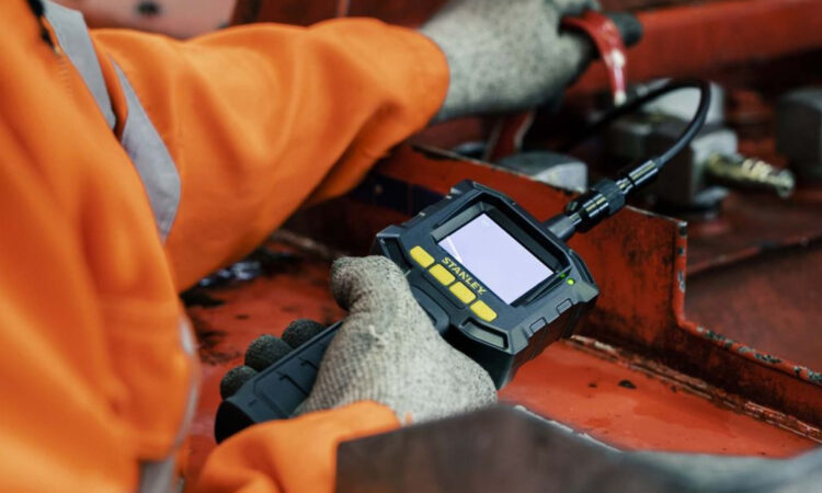 REDS employee using specialist equipment
