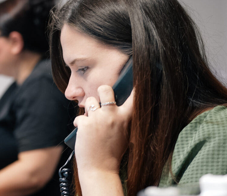 REDS office employee answering phone