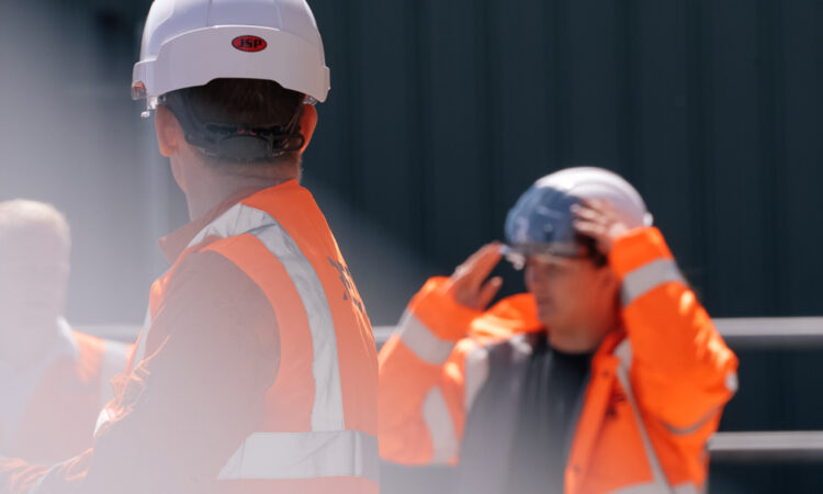 Two REDS employees on a job