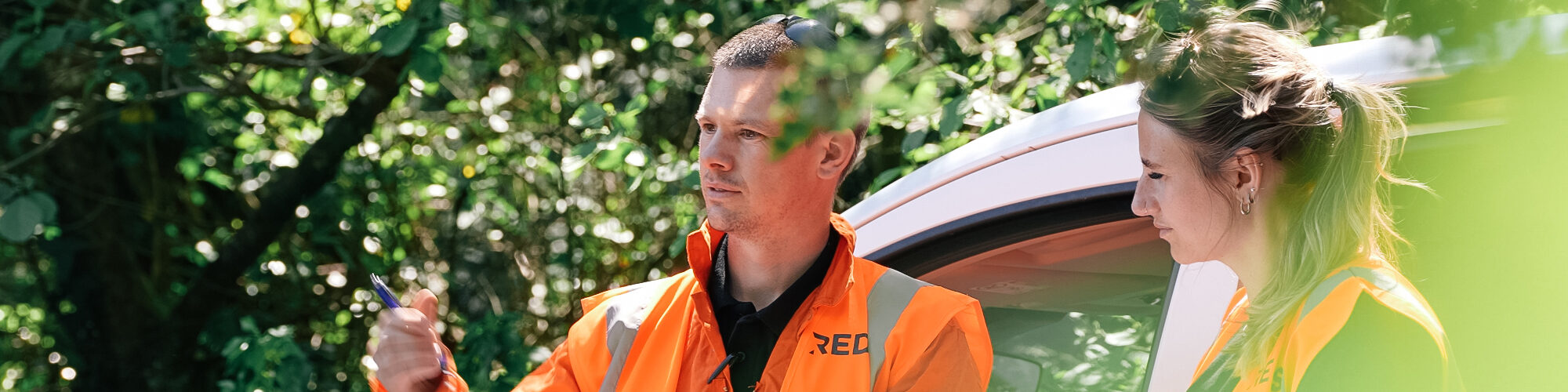 Two REDS employees overlooking a job