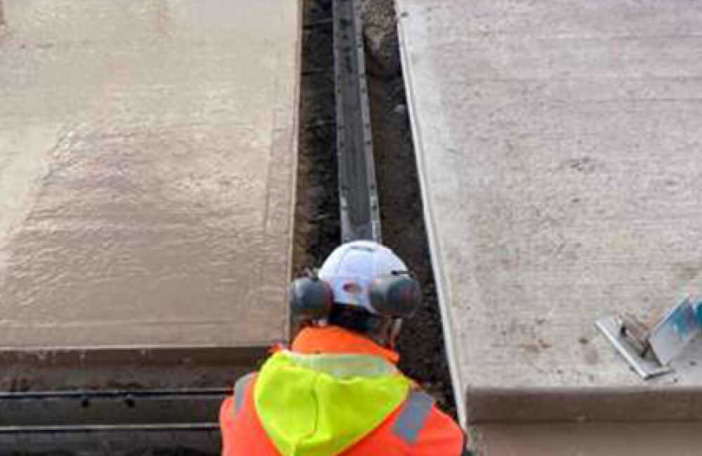 Engineer laying drainage